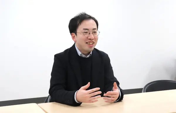 塚本功治主任